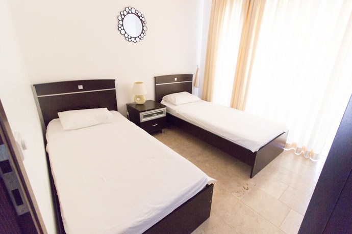 Imagen de la habitación del Palm Lane Villa. Foto 7
