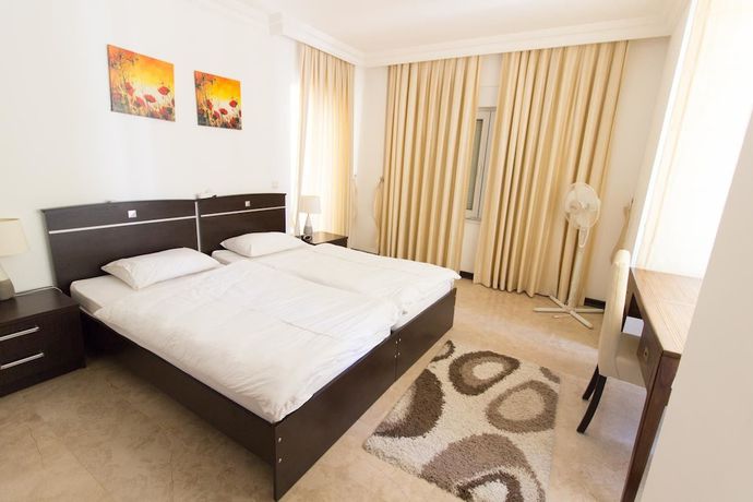 Imagen de la habitación del Palm Lane Villa. Foto 11