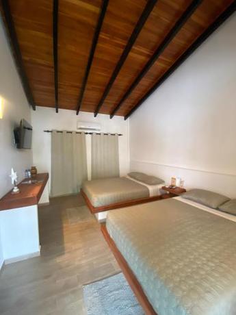 Imagen de la habitación del Palma Dorada Hotel & Boutique. Foto 19