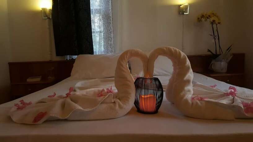 Imagen de la habitación del Palma Rosa Hotel. Foto 19