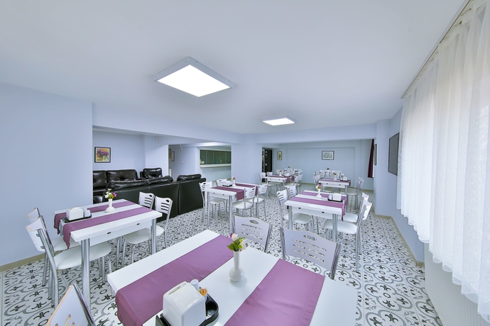 Imagen del bar/restaurante del Palmada Hotel. Foto 5