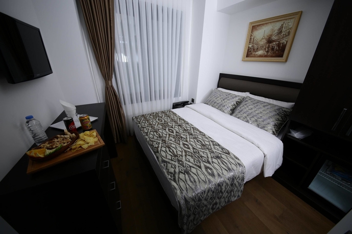 Imagen de la habitación del Pandora Suit Otel. Foto 12