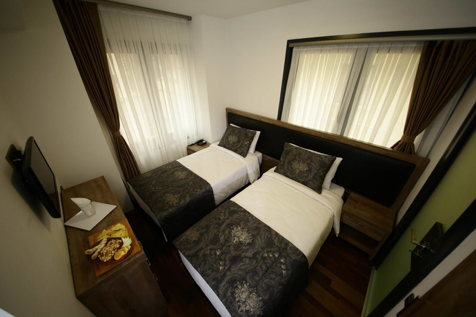 Imagen de la habitación del Pandora Suit Otel. Foto 14