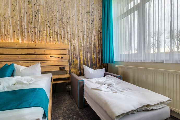 Imagen de la habitación del Panorama Ferien Hotel Harz. Foto 13