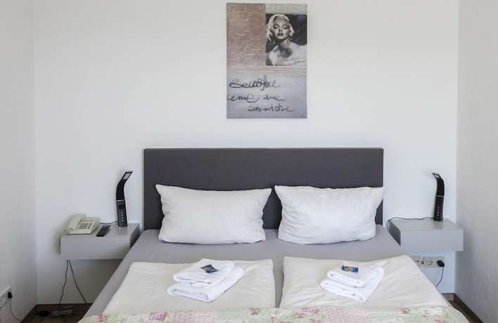 Imagen de la habitación del PanoramaHotel Lilienstein. Foto 15