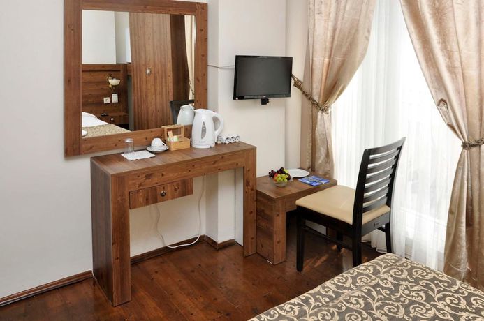 Imagen de la habitación del Paperon Hotel. Foto 8