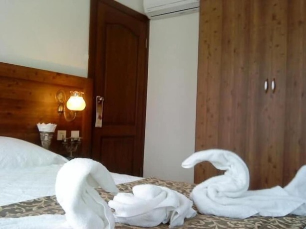 Imagen de la habitación del Paperon Hotel. Foto 11