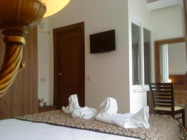 Imagen de la habitación del Paperon Hotel. Foto 12