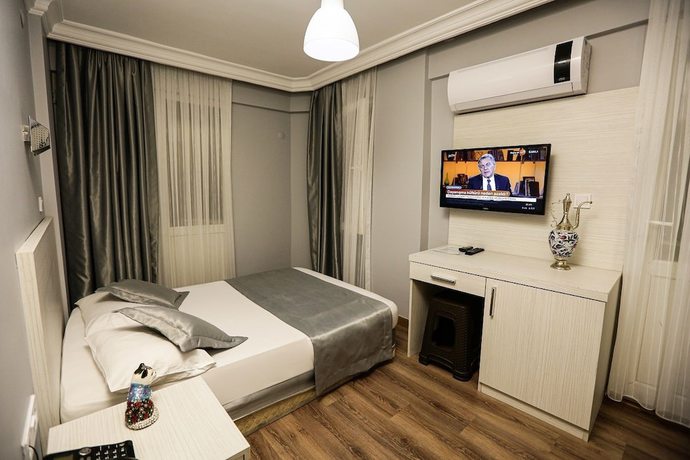 Imagen de la habitación del Papillonada Hotel. Foto 9