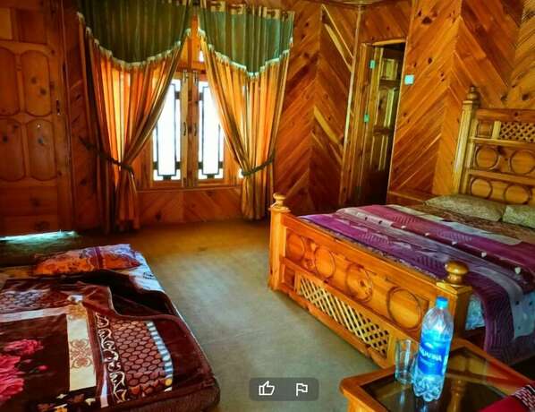Imagen de la habitación del Paradise Hotel and Hillside Cottage Shogra. Foto 14