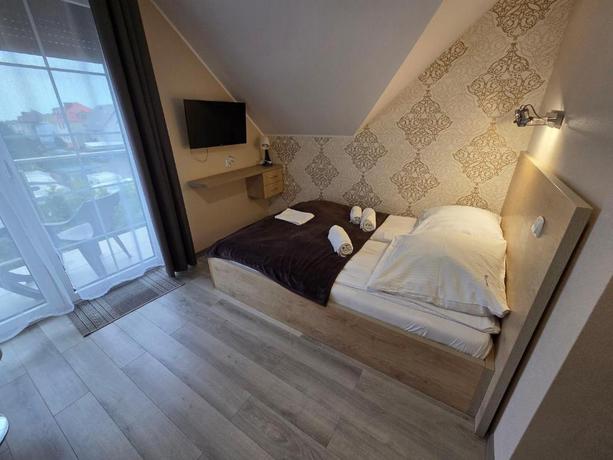 Imagen de la habitación del Paradise, Jastarnia. Foto 14