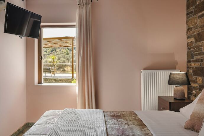Imagen de la habitación del Paramithenio Village Beach Resort and Spa. Foto 13