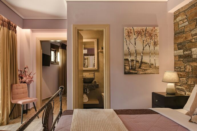 Imagen de la habitación del Paramithenio Village Beach Resort and Spa. Foto 19
