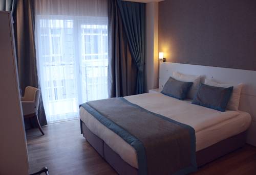Imagen de la habitación del Parion House Hotel. Foto 2