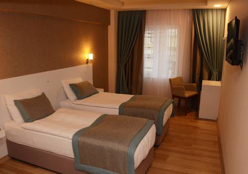 Imagen de la habitación del Parion House Hotel. Foto 3