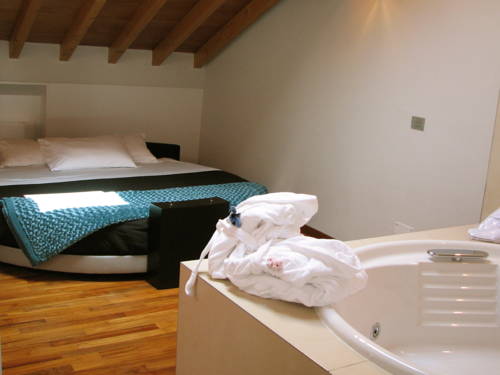 Imagen de la habitación del Parizzi Suites & Studio. Foto 5