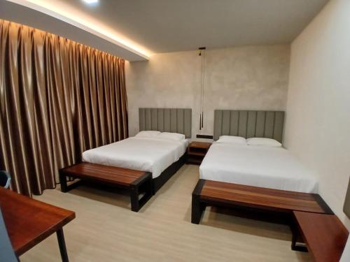 Imagen de la habitación del ParkCity Inn. Foto 15