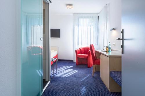 Imagen de la habitación del Parkhotel Schillerhöhe. Foto 6