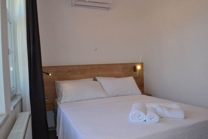 Imagen de la habitación del Parli Hotel. Foto 13