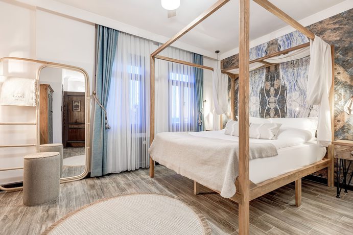 Imagen de la habitación del Parna Hotel. Foto 14