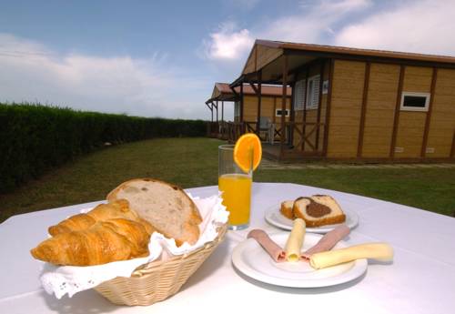 Imagen de la habitación del Parque De Campismo Da Ilha Do Pessegueiro. Foto 11