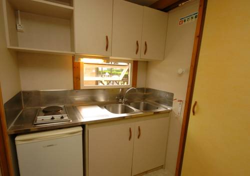 Imagen de la habitación del Parque De Campismo Da Ilha Do Pessegueiro. Foto 13