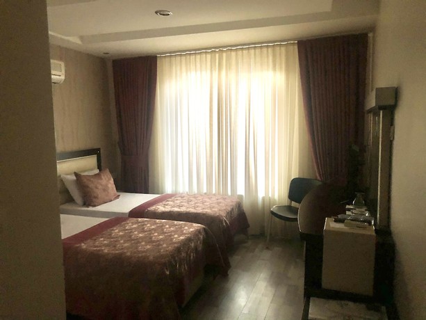 Imagen de la habitación del Pasabey Hotel. Foto 13