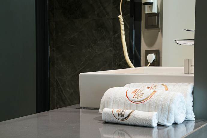 Imagen de la habitación del Pasaport Pier Hotel. Foto 15