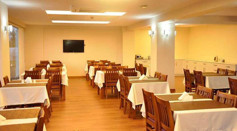 Imagen del bar/restaurante del Pasha Suites Hotel. Foto 2