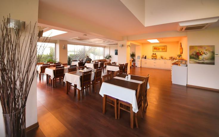 Imagen del bar/restaurante del Pasha Suites Hotel. Foto 3