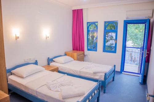 Imagen de la habitación del Patara Beach Hotel. Foto 18