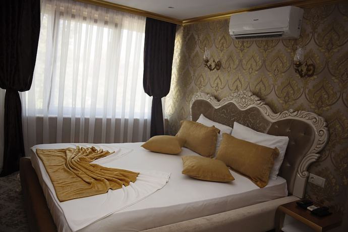 Imagen de la habitación del Patron Hotel. Foto 6