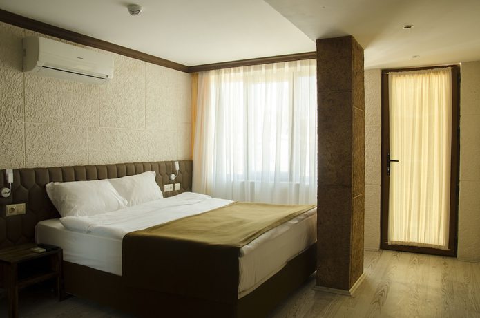 Imagen de la habitación del Patron Hotel. Foto 9