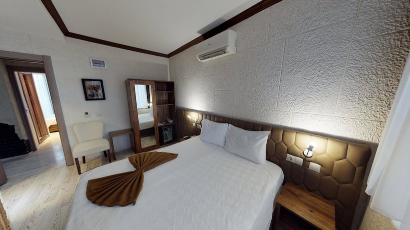 Imagen de la habitación del Patron Hotel. Foto 10