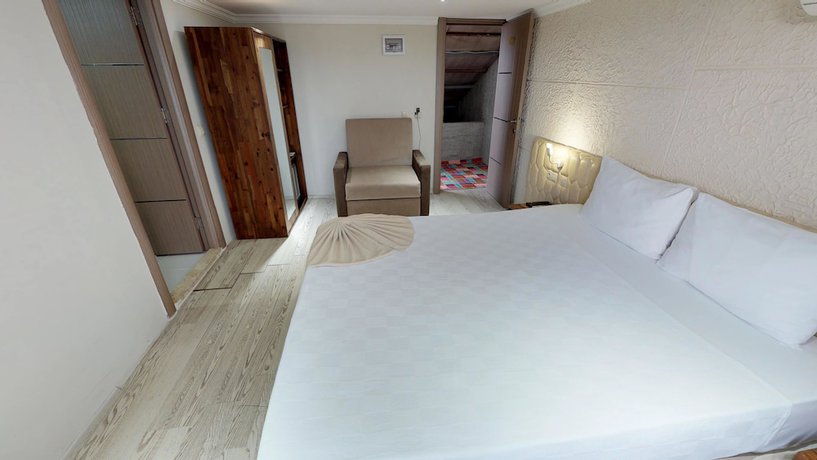 Imagen de la habitación del Patron Hotel. Foto 13