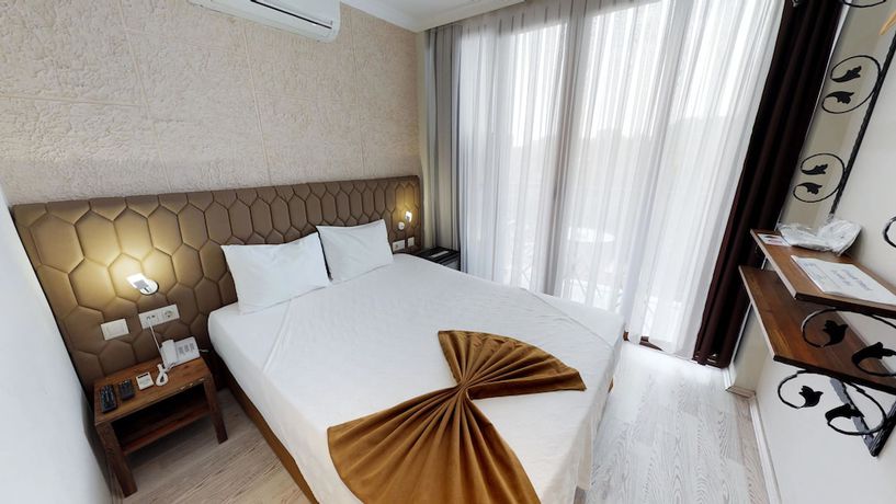 Imagen de la habitación del Patron Hotel. Foto 18