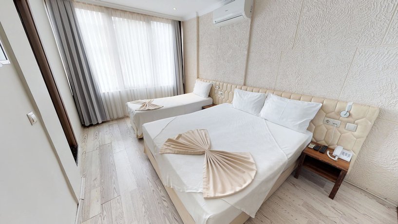 Imagen de la habitación del Patron Hotel. Foto 19