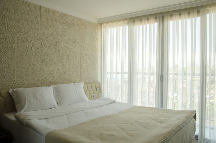 Imagen de la habitación del Patron Hotel. Foto 20