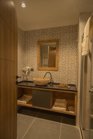 Imagen de la habitación del Pazarcik Mountain Hotel. Foto 19