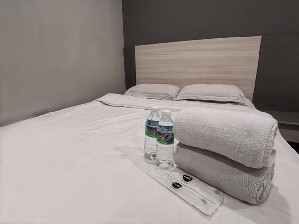 Imagen de la habitación del Pearl Hotel. Foto 13