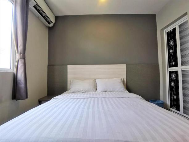 Imagen de la habitación del Pearl Hotel. Foto 15