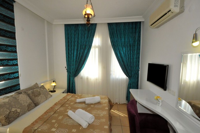 Imagen de la habitación del Pegasus Hotel and Villa. Foto 13