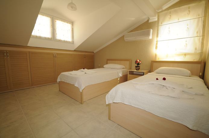 Imagen de la habitación del Pegasus Hotel and Villa. Foto 15