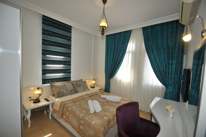 Imagen de la habitación del Pegasus Hotel and Villa. Foto 18