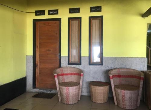 Imagen de la habitación del Penginapan Erbysa. Foto 17