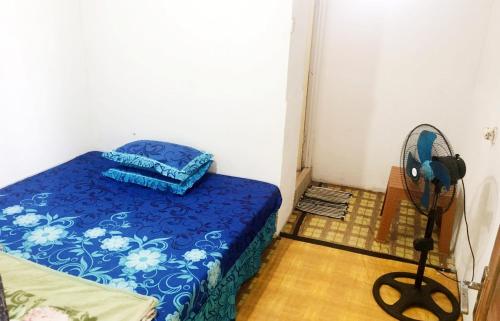 Imagen de la habitación del Penginapan Erbysa. Foto 18
