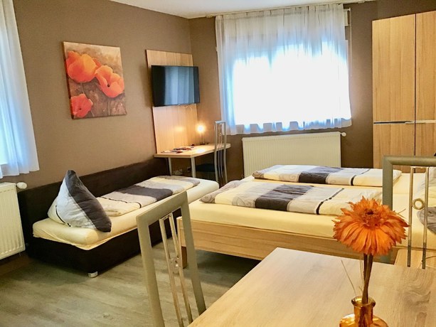 Imagen de la habitación del Pension am Schlossberg. Foto 9