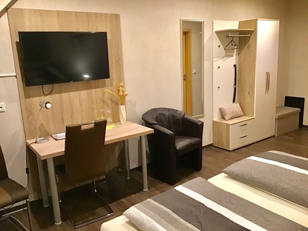 Imagen de la habitación del Pension am Schlossberg. Foto 11