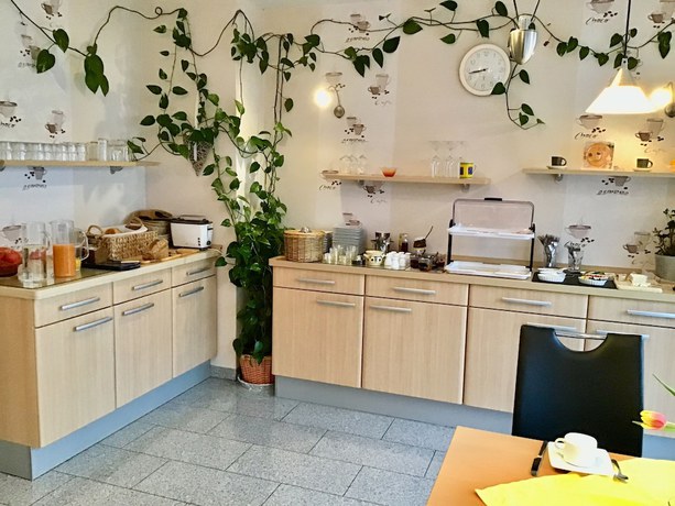 Imagen del bar/restaurante del Pension am Schlossberg. Foto 2