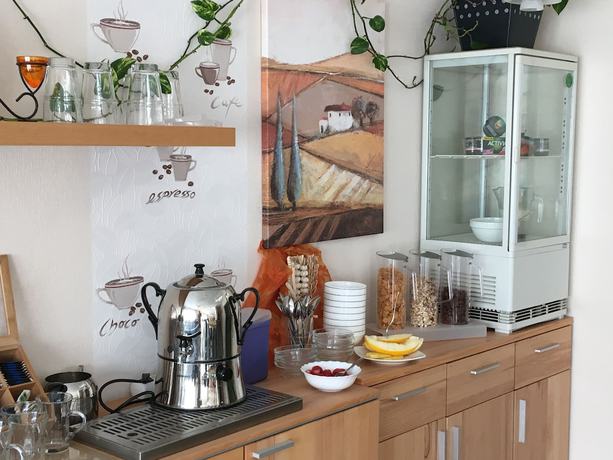 Imagen del bar/restaurante del Pension am Schlossberg. Foto 5